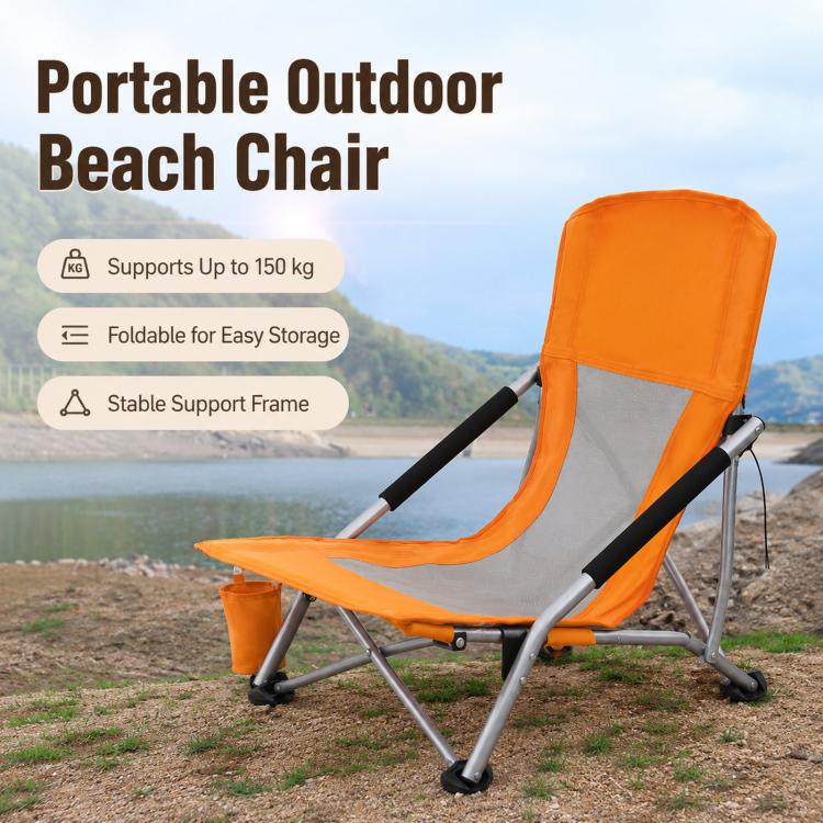 Orange portable folding beach chair with mesh back and side cup holder pouch