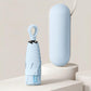 Light blue 5-fold capsule umbrella with carrying case, closed canopy cover