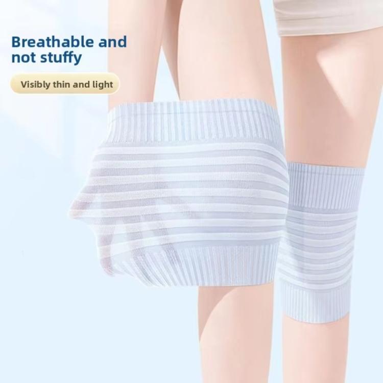 Pair of light blue breathable knee pads with ribbed bands and snug fit