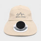 Beige wide-brim solar fan hat with black circular fan and white base