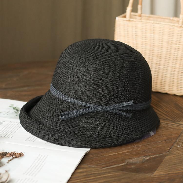 Black straw cloche sun hat with dark ribbon bow on gray band, foldable style
