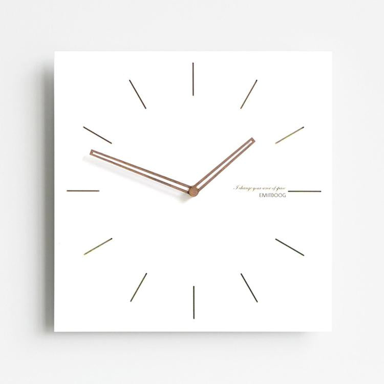 Square wall clock with white face, dark wood hands, minimal line tick markers, angled view