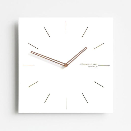 Square wall clock with white face, dark wood hands, minimal line tick markers, angled view