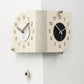 Beige dual-dial corner wall clock with gold hands and silver knob mounts