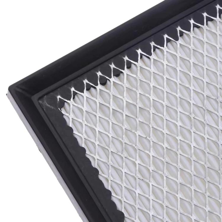 Cabin air filter close-up of white grid media inside black frame