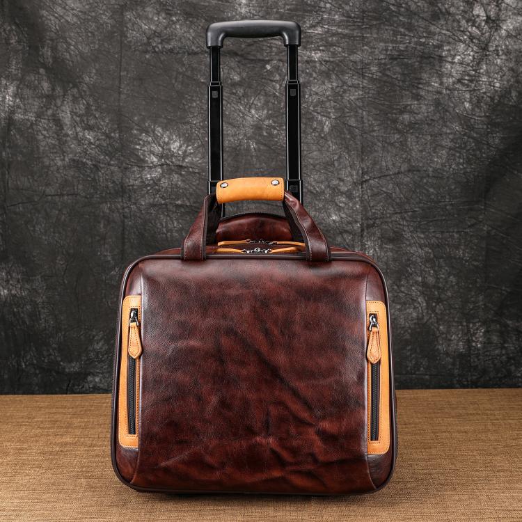 Dark brown leather rolling briefcase with tan trim and front trolley handle