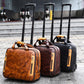 Set of three rolling leather briefcases with pull handles and front zip pockets