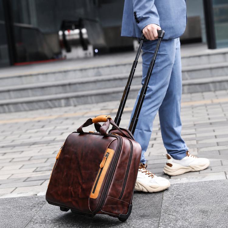 Vintage leather rolling briefcase rolling on wheels with telescoping handle, dark brown