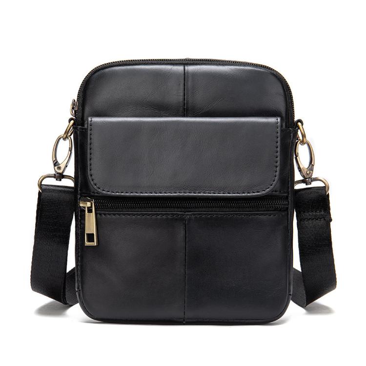 Black leather crossbody bag with front flap panel, top zip closure, adjustable shoulder strap
