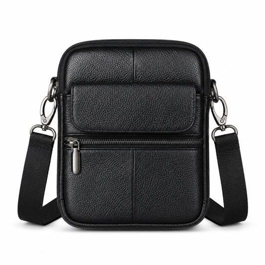 Black pebbled leather crossbody bag with front flap and front zip pocket, wide shoulder strap