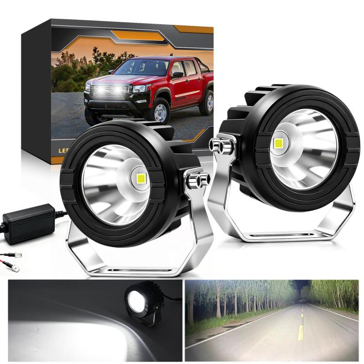 Pair of black round LED spotlights with silver mounts plus power wiring harness