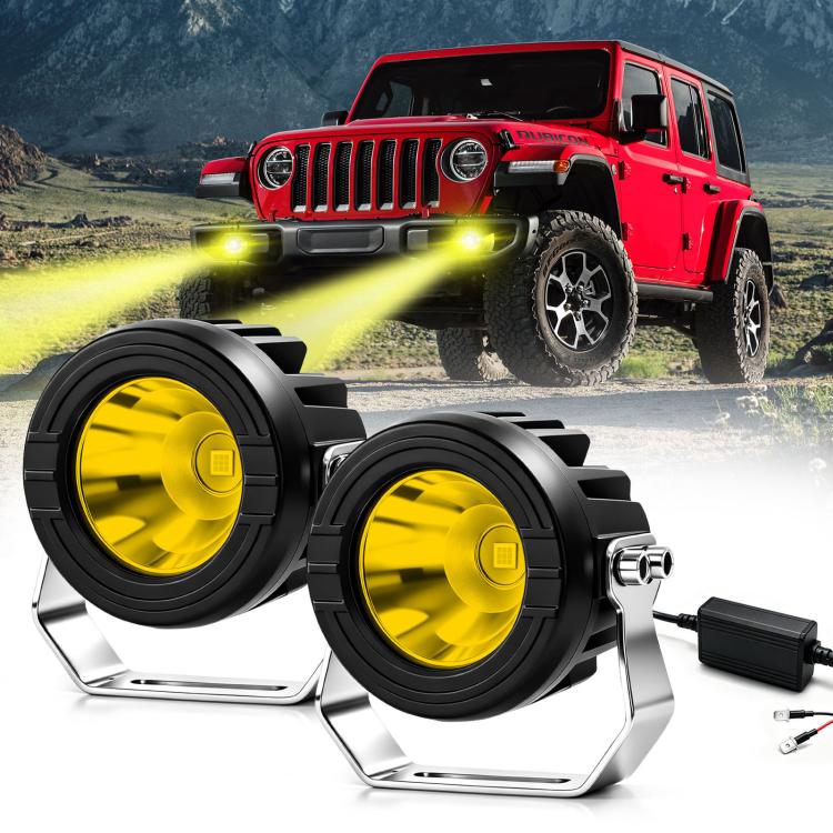 Round car truck spotlight pair with black housing, silver bracket, yellow LED glow