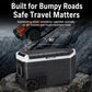 Portable car refrigerator cooler on wheels, rugged design for uneven roads.