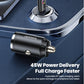 Black USB-C car charger with orange port insert and two metal plug pins