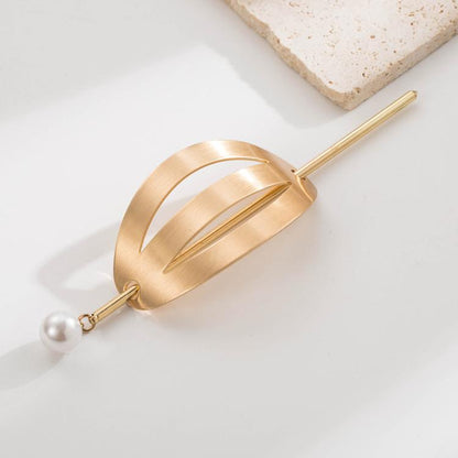 Gold hair bun cuff slide with pearl pin and hollow geometric wave design