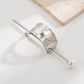 Silver hair bun cuff slide with raised zigzag texture and pearl drop pin