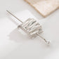 Silver wave hair cuff with pearl drop pin and textured metal slide