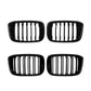 Set of black oval grille inserts shown as four pieces with vertical slats