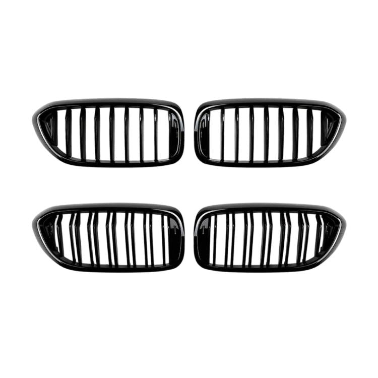 Set of four black oval grille inserts with vertical slat openings
