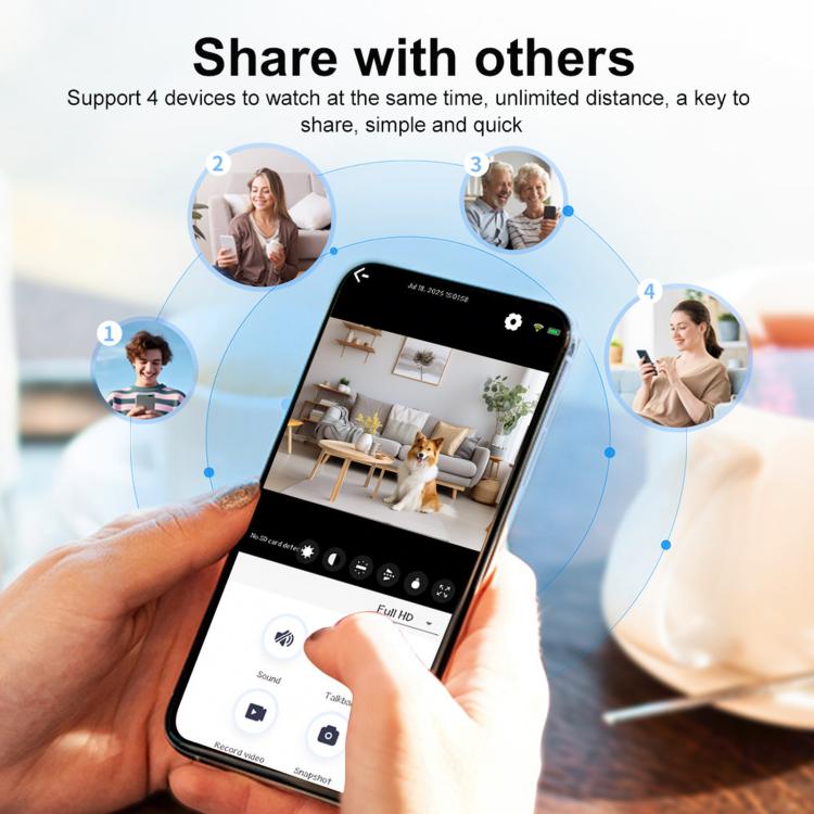 Indoor security camera held in hand with smartphone streaming on screen