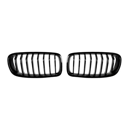 Front kidney grille pair with chrome vertical slats and black plastic surround.