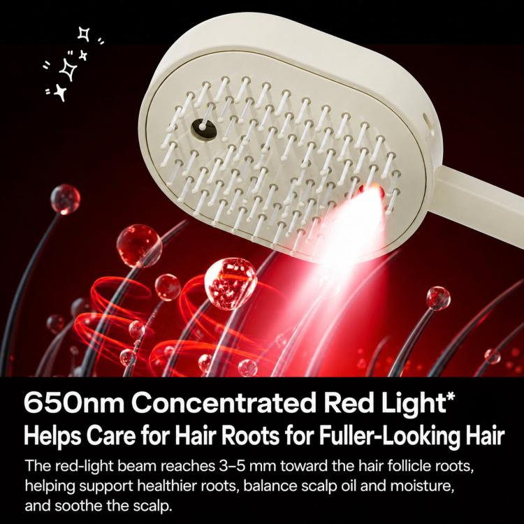 Cream electric spray hair massage brush with red light glow at the bristle head