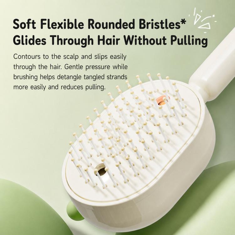 Cream electric hair spray massage brush with flexible rounded bristles on face
