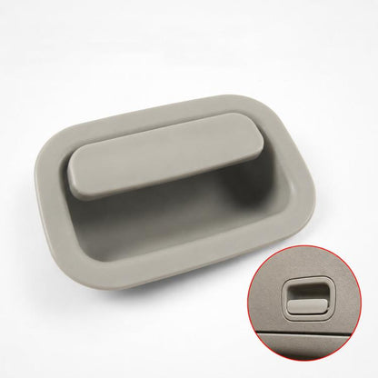 Light gray interior door handle with rectangular push button