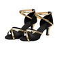 Strappy peep-toe dance sandals, black with gold trim, mid heel, cross-strap style