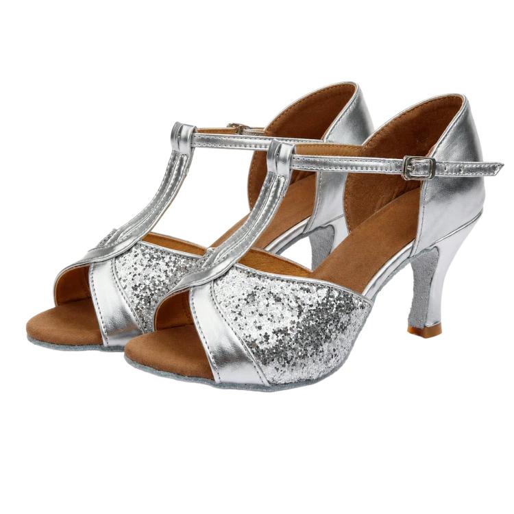 Women’s Latin dance sandals, silver glitter straps with tan suede sole and buckle.