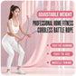 Pink cordless battle rope with foam grips used during home arm workout