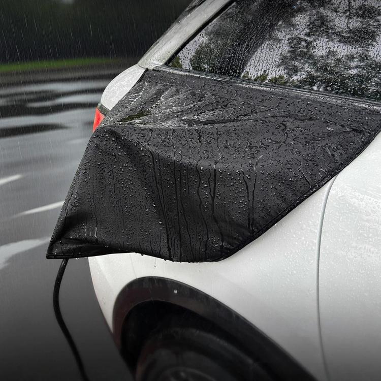 Black EV charging gun rain cover for weatherproofing the charging port