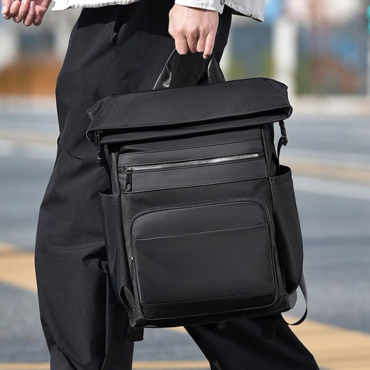 Black laptop backpack with front zip pocket and two strap handles