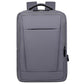 Gray laptop backpack with top handle, front zip pocket, and padded back panel