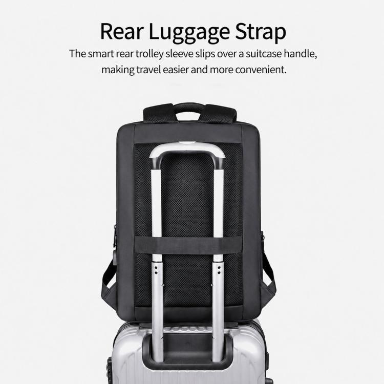 Black laptop backpack with rear luggage strap sleeve over a trolley handle