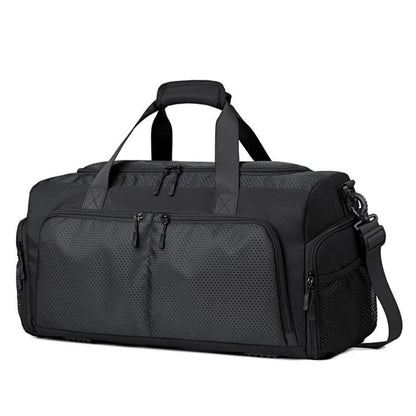 Black waterproof sports duffel bag with top handles, shoulder strap, and zip front pocket