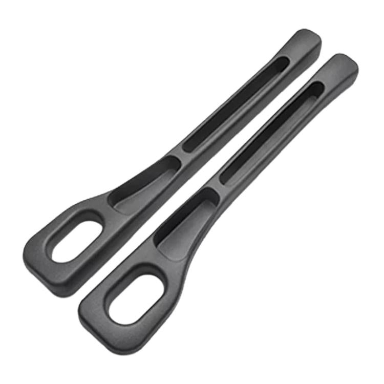 Black car seat gap filler strip with oval cutouts and center channel