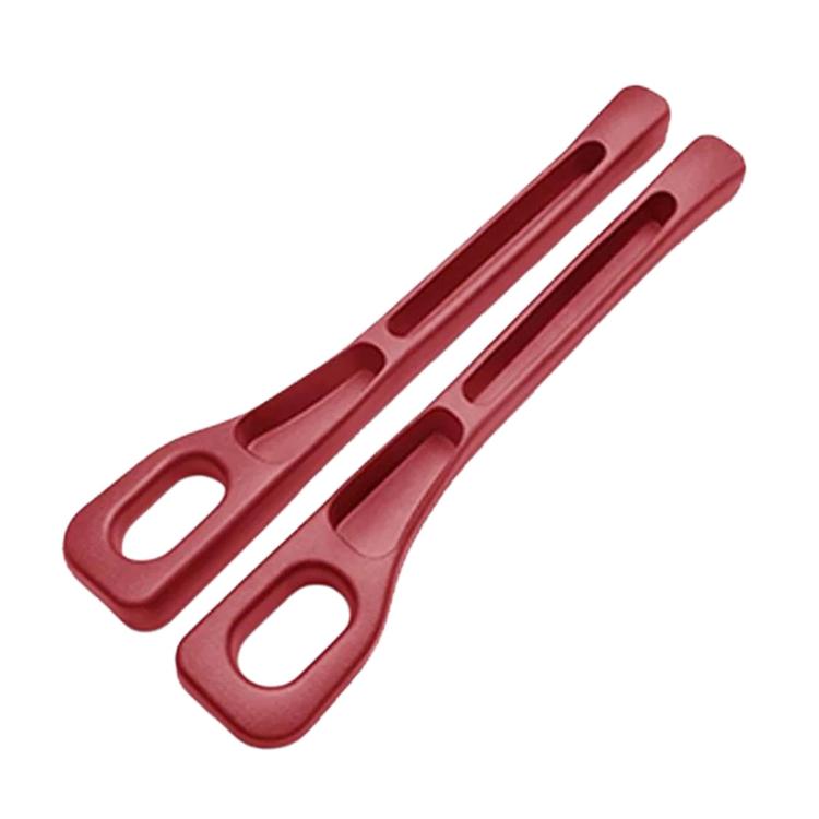Red car seat gap filler strip with oval cutouts and center channel