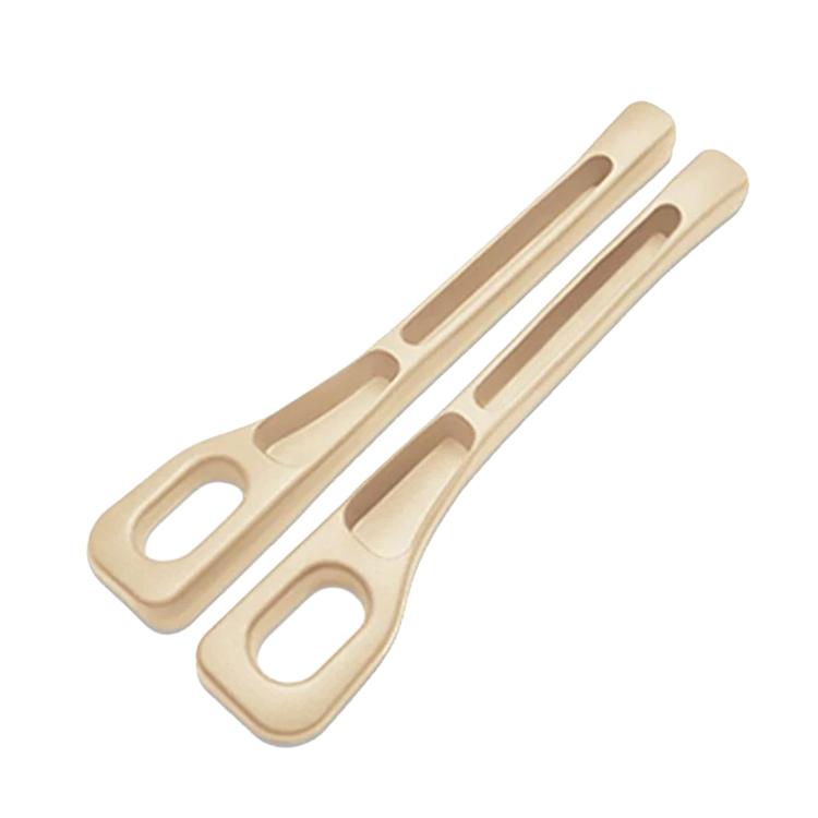 Beige car seat gap filler strip with oval cutouts and center channel