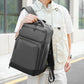 Dark gray laptop backpack with front pocket and zip compartments, worn on back