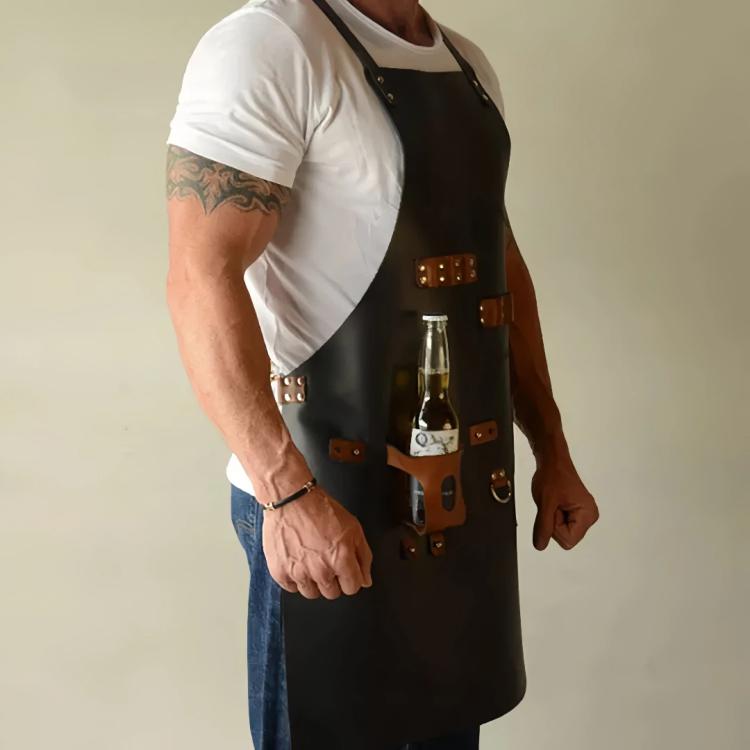 Brown waterproof BBQ apron worn with bottle holster and multiple leather accessory pockets