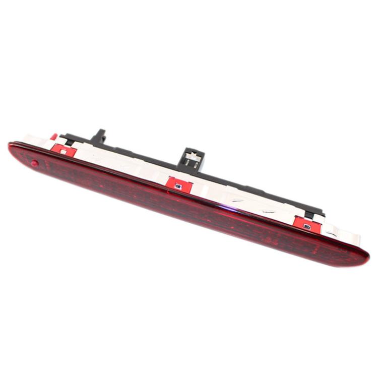 Red high-mounted brake light lens with black housing and mounting clips