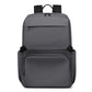 Gray laptop backpack with zip front, top handle, and padded shoulder straps