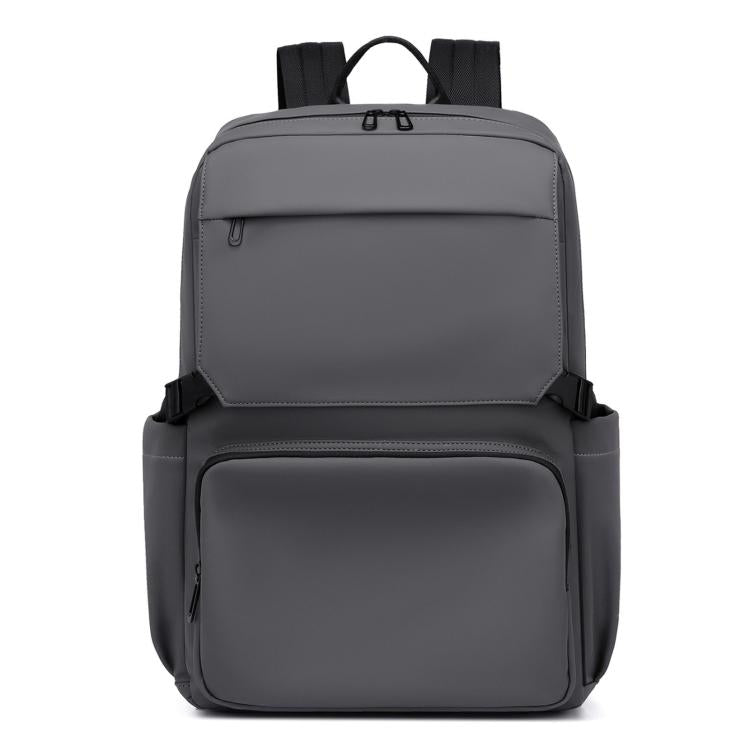 Gray laptop backpack with zip front, top handle, and padded shoulder straps
