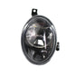Front bumper fog light with clear lens and black housing, angled close-up