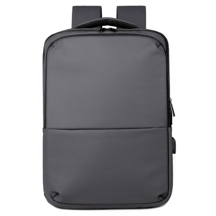 Laptop backpack with top handle, front zip pocket, and padded straps in gray