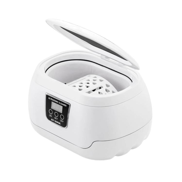 White ultrasonic jewelry cleaner with open lid and removable perforated basket