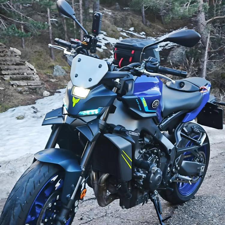 Yamaha MT-09 front spoiler winglet kit installed on blue motorcycle.