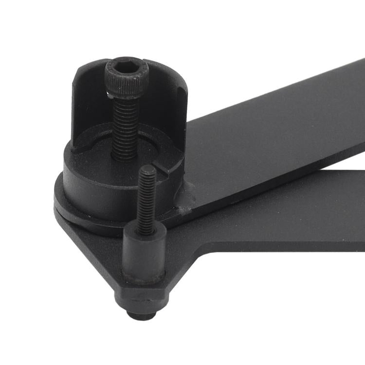 Black cam chain removal tool end with threaded posts and fork clamp