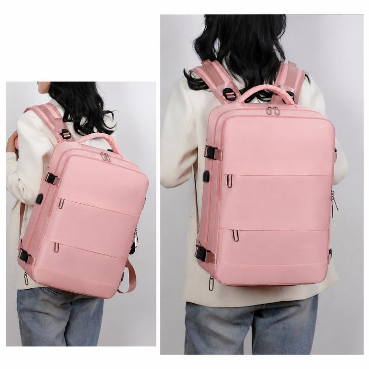 Pink travel backpack worn on back, front view with straps and buckles